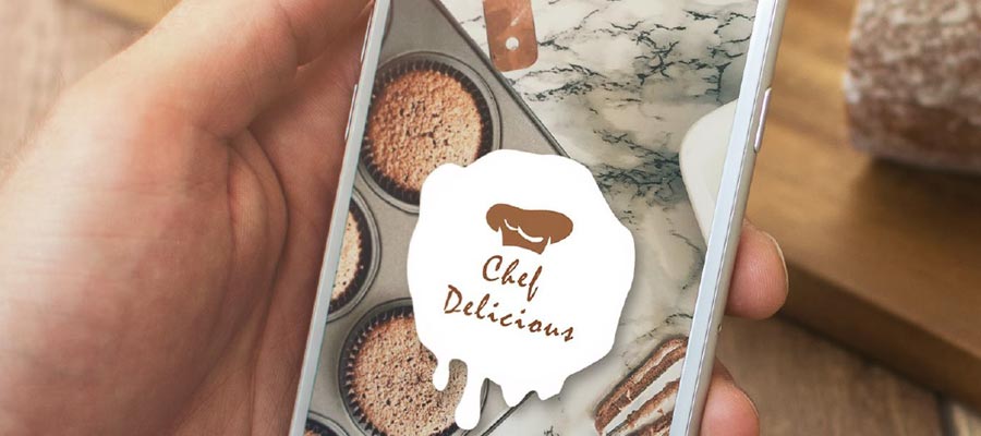 Hand Holding iPhone with App